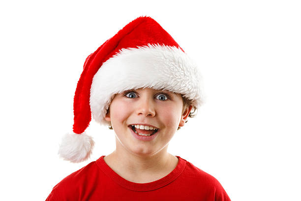 istock Christmas time - boy with Santa Clause hat 625870112
