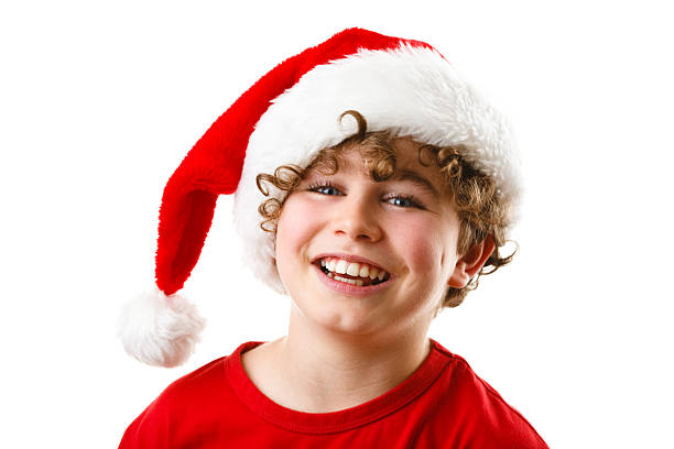 istock Christmas time - boy with Santa Clause hat 625870188
