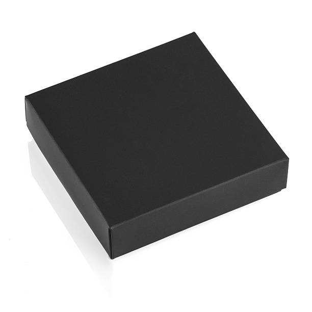 istock Small black matte cardboard box isolated on white background 625871536