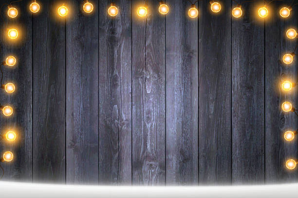 istock Christmas Lights on Horizontal blank Wooden background with snow 625874358