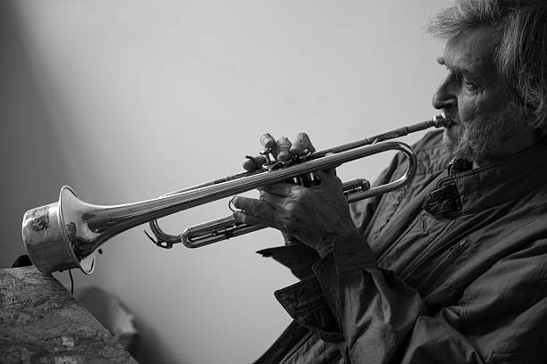 istock Eldery man playing the trumpet 625878704