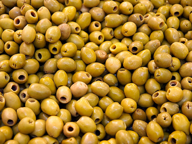 Pitted green olives stock photo