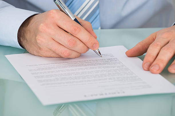 istock Businessman Signing Contract Form 625880632
