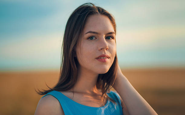 istock beautiful girl in summer 625880896