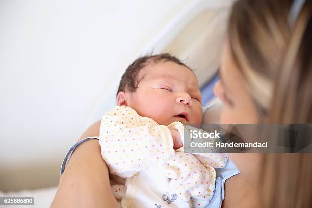 New Born Baby With His Mother Stock Photo - Download Image Now - Mother, Newborn, Hospital