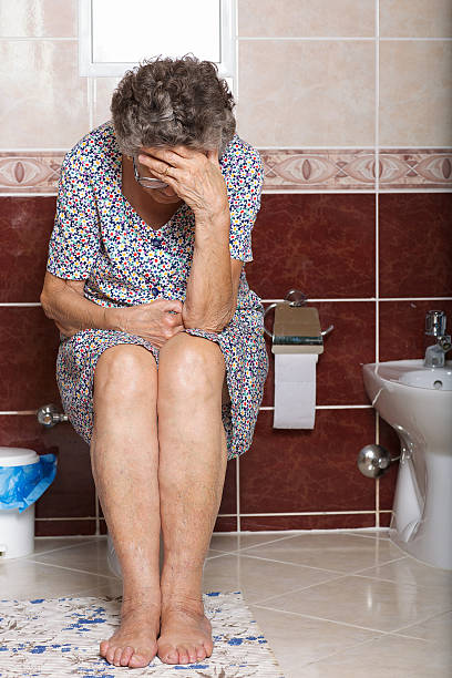 istock Old woman in a bathroom 625886924