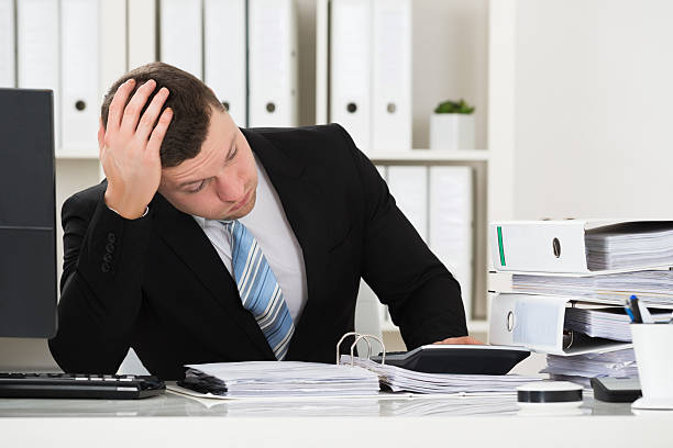 istock Stressed Accountant Sitting At Desk In Office 625888252