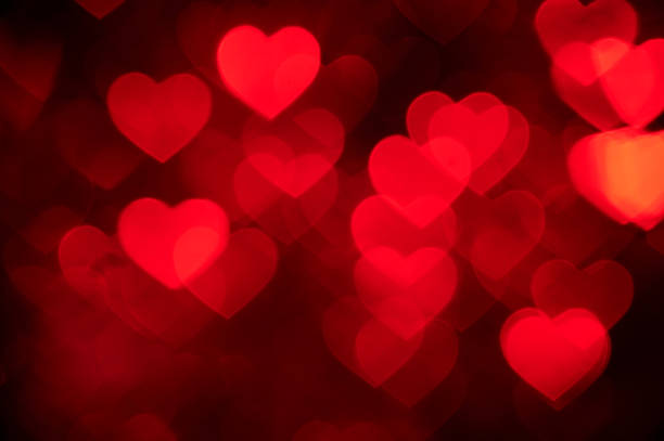 istock red heart bokeh background photo, abstract holiday backdrop 625888772