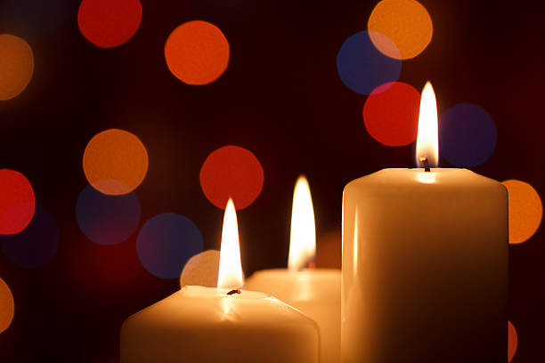 istock Christmas candles, with bokeh spot lights 625889652