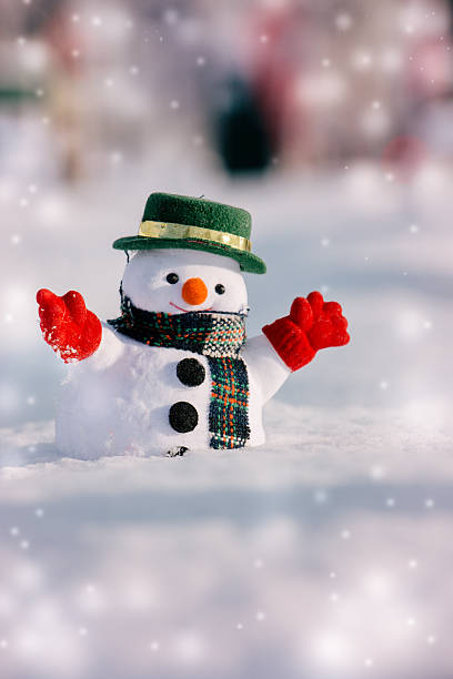 istock Snowman stand among pile of snow. 625890462