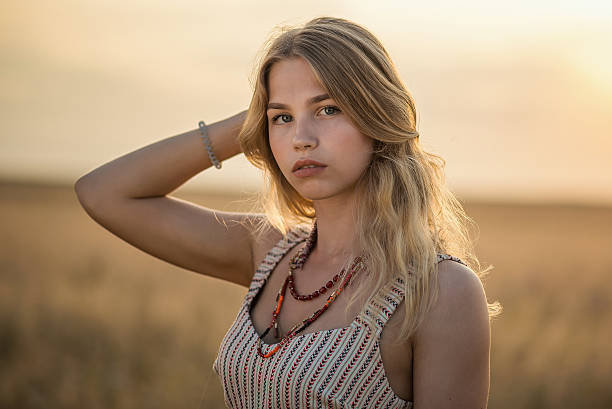 istock young girl at sunset 625890504