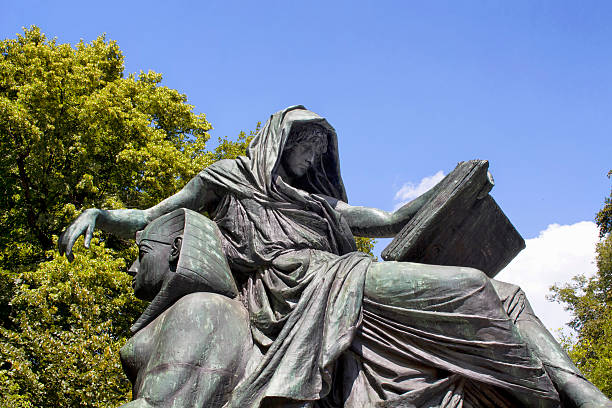 Woman reading book sculpture at \