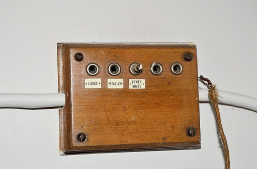 Old wooden buzzer box in stately home
