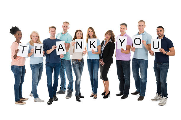 istock Creative Business People Holding Thank You Sign 625894832