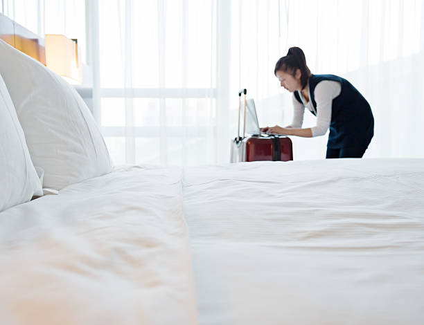 istock Young woman at hotel room 625896206