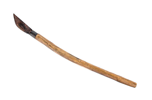 istock Old wooden knife sharpener with long handle isolated on white 625903082