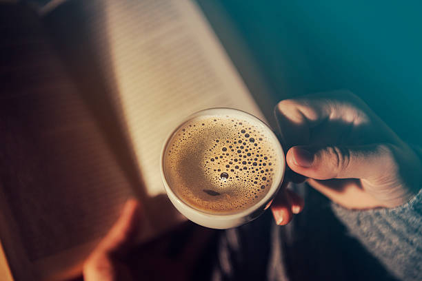 istock Girl reading and having a coffee 625908042