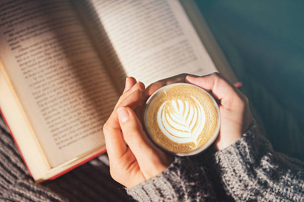 istock Girl reading and having a coffee 625908550