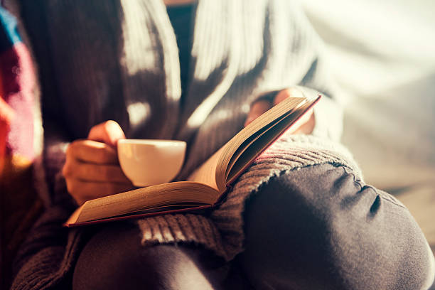 istock Girl reading and having a coffee 625908726
