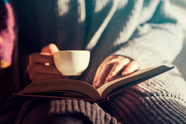 istock Girl reading and having a coffee 625908790