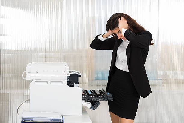 istock Irritated Businesswoman Looking At Printer Machine At Office 625908806