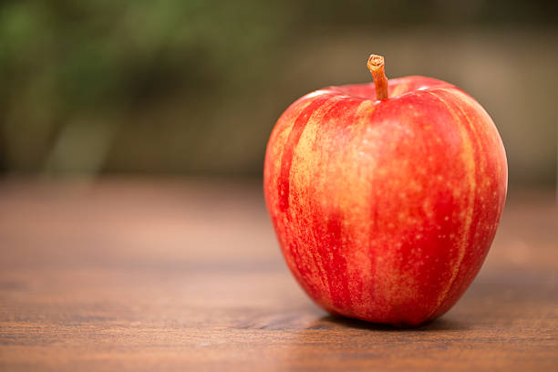 istock Health, dieting themed scene with red apple 625908936
