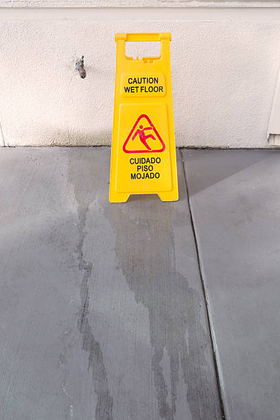 istock Slippery floor surface warning sign and symbol in building, hall 625909658