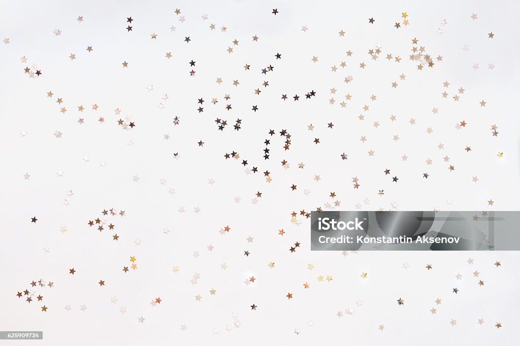 Fondo de vacaciones con confeti estrella de plata. - Foto de stock de Confeti libre de derechos