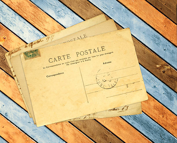 istock Retro post cards on ancient wooden planks 625910054
