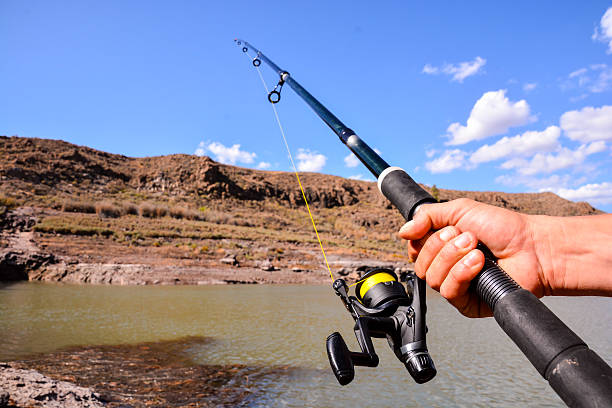 istock Fishing with rod on lake 625910826
