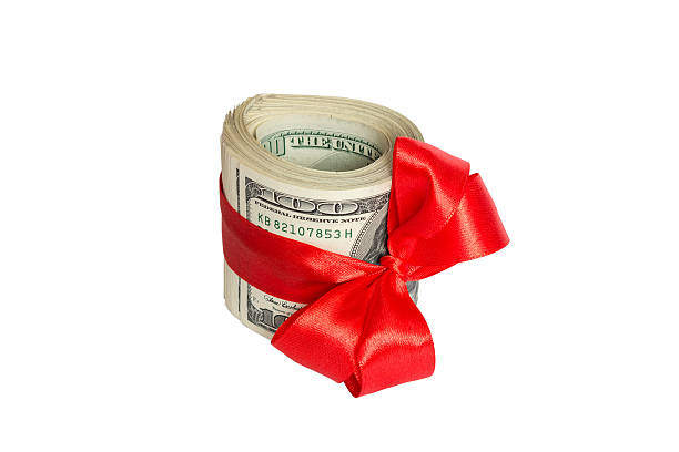 istock dollar with red bow Isolated on white background 625912646