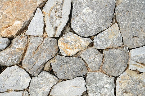 istock Big rocks arrange to build wall, background and pattern 625913128