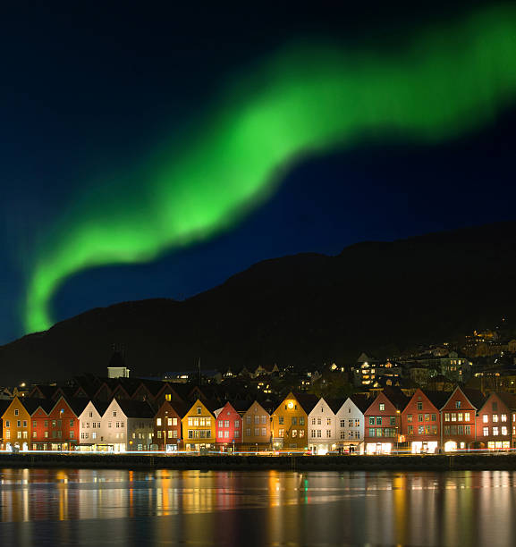 Northern lights - Aurora borealis over Bryggen in Bergen, Norway Northern lights - Aurora borealis over Bryggen in Bergen, Norway. geomagnetic storm photos stock pictures, royalty-free photos & images