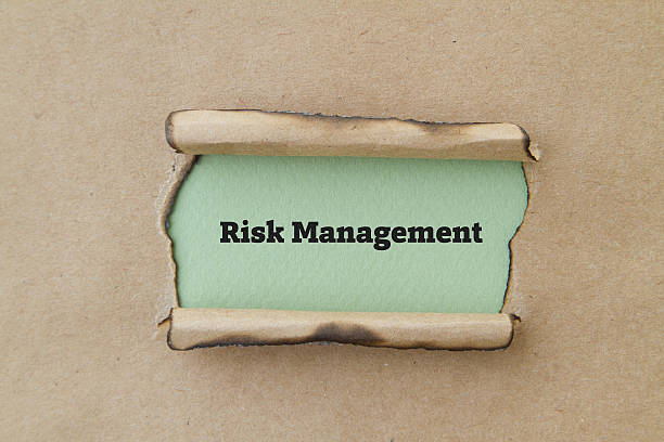 istock Risk Management written under burnt torn paper. 625924114