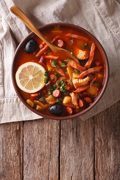 istock Traditional Russian soup solyanka on the table. Vertical top view 625924702