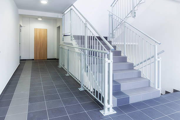 istock Modern staircase in apartment building 625925666