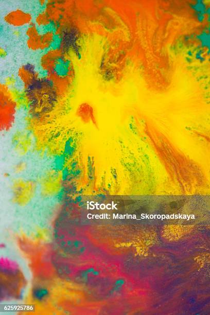 Whirlwind Vortex Spreads Colored Ink Colors On A White Background Stock Photo - Download Image Now