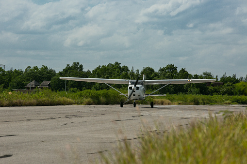 Small airplane isolated on white background