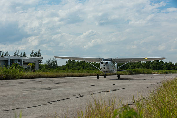 Free Stock Photo of Small Airplane Parked on Airport Tarmac | Download ...
