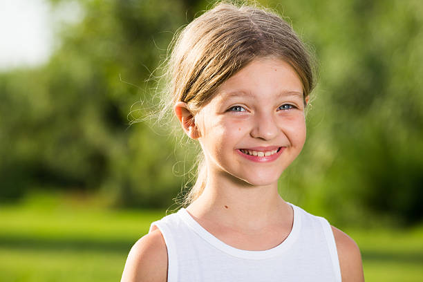 istock close up girl smiling 625927504