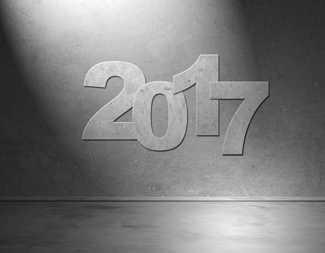 Happy new year 2017 on wall background