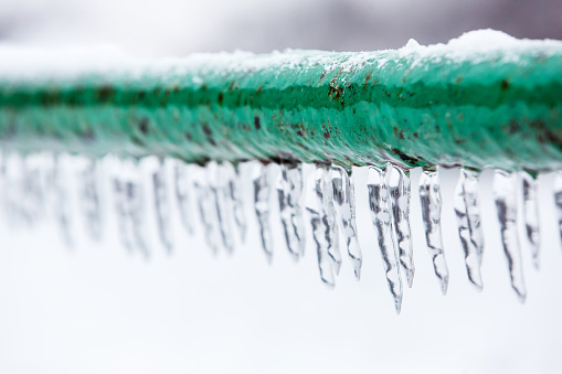 Icicles hanging from a rock beside Carretera Austral at Cerro Castillo national park in the Chilean Patagonia