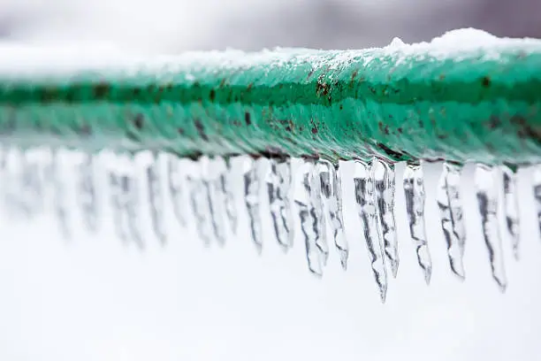 Photo of Frozen icy down pipe