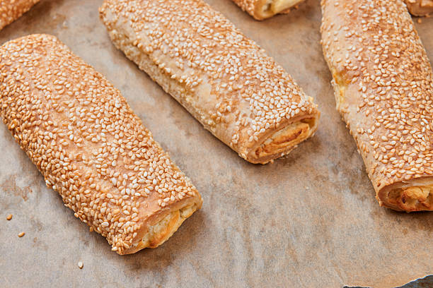 istock Homemade appetizers with cheese fillings. Cakes sprinkled with s 625935172