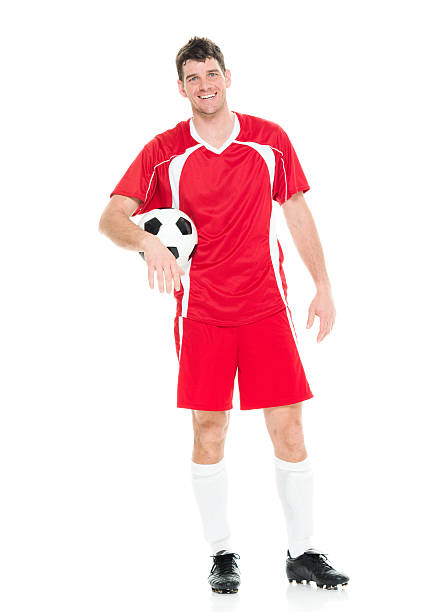 istock Cheerful soccer player holding ball 625935902