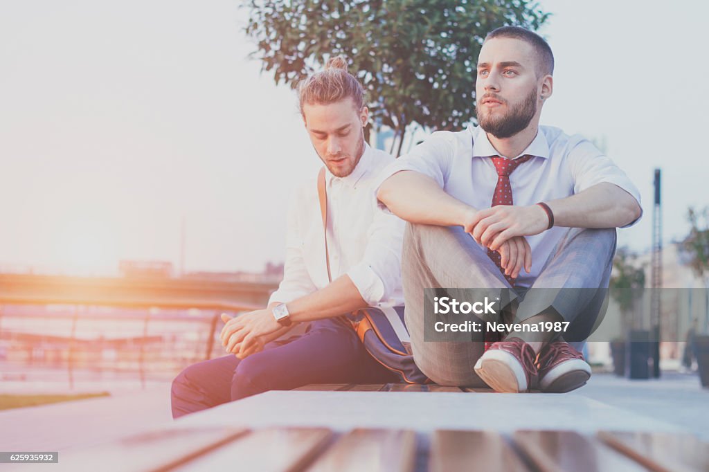 two business men outdoors,twin brothers Adult Stock Photo