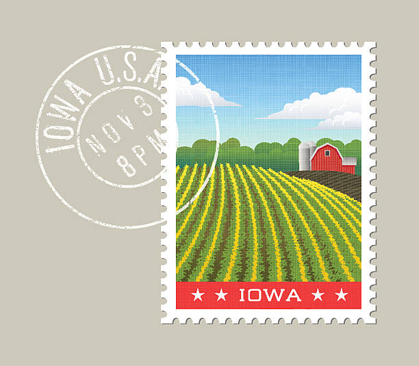 Illustration of corn field and red barn. Iowa, United States Iowa postage stamp design. Vector illustration of corn field and red barn. Grunge postmark on separate layer iowa stock illustrations