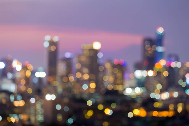 istock Blurred lights city office building downtown 625945966