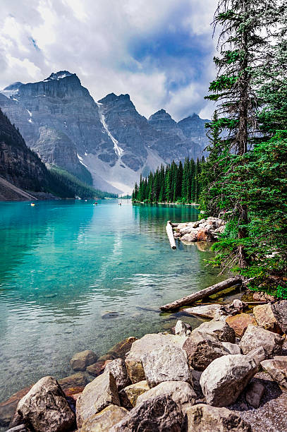 lake, valley and snow mountain in the Canadian Rockies in Banff National Park, Alberta, Canada rocky mountains banff alberta mountain stock pictures, royalty-free photos & images