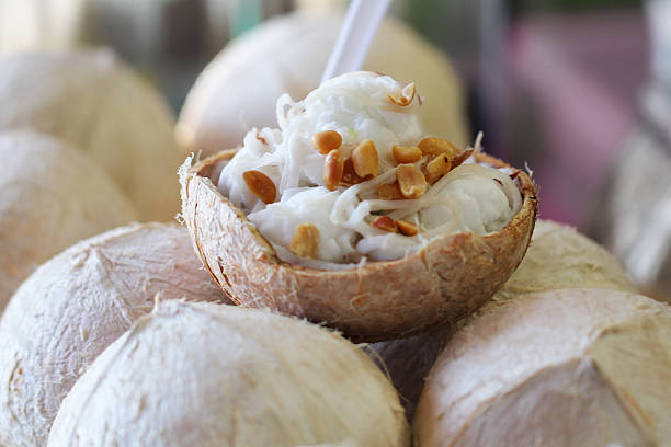 istock coconut Ice Cream with nuts and coconut flake in coconut ball 625954124